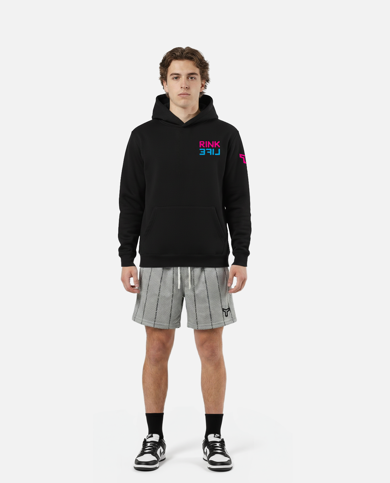 model wearing titan battlegear gray athletic shorts with black drawstring on a white background